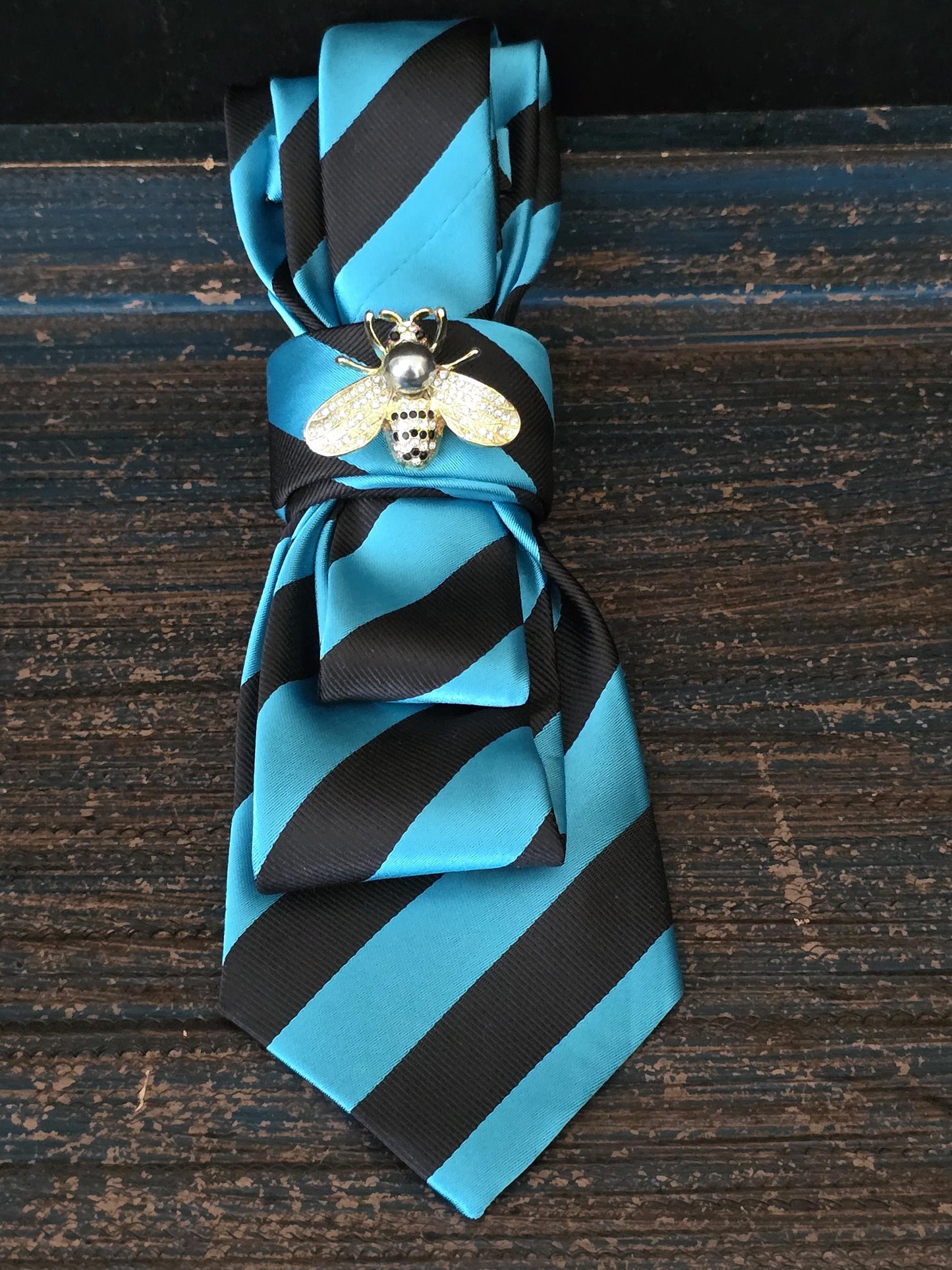 Teal and Black Stripe Silk Necktie Necklace: Rhinestone Bee Brooch